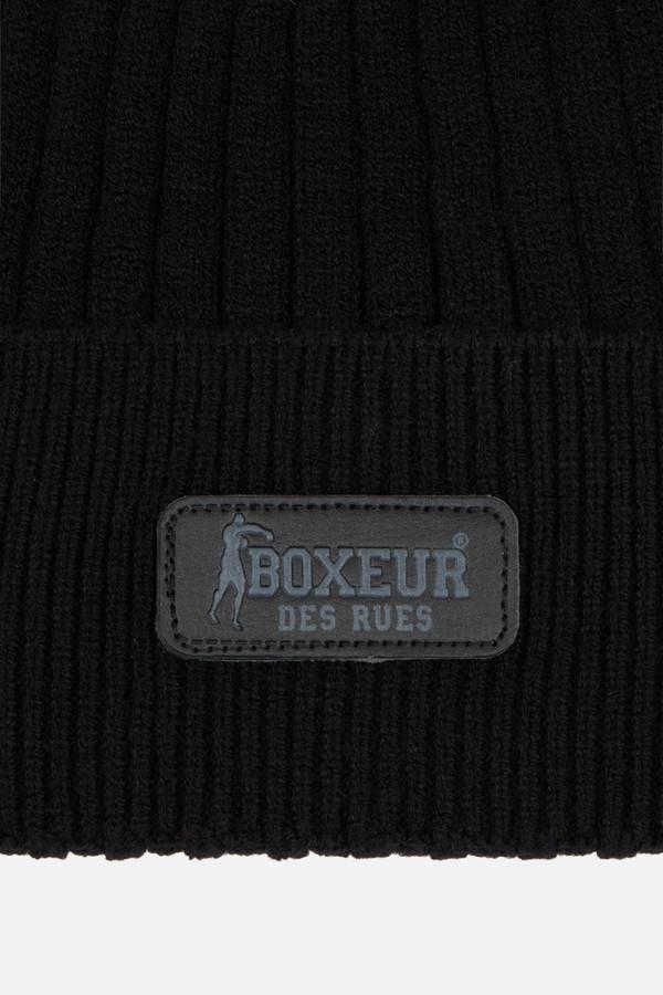 Cappelino Nero Con Maglia A Coste E Placchetta Logata