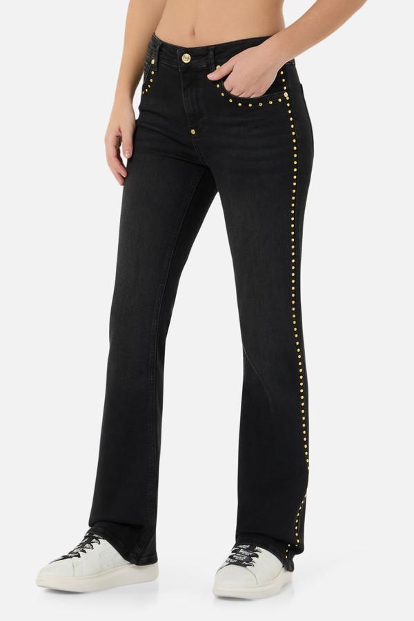 Jeans Neri A Zampa Con Borchie