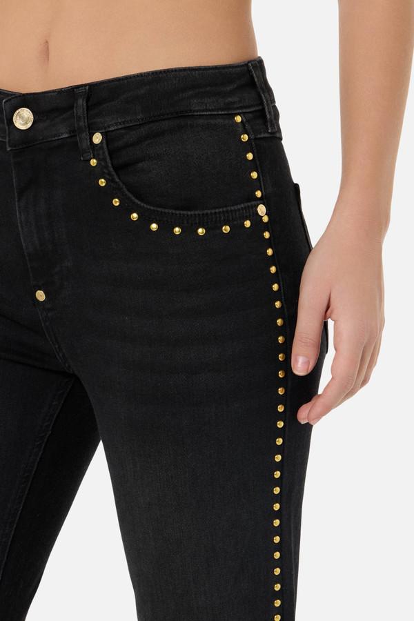 Jeans Neri A Zampa Con Borchie